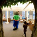 Lauderdale Co.:  Karla King, 6, walks with HIPPY P. Potamus to a nice spot to read a book at the Florence Library as it greets children and makes contacts with their parents for the HIPPY Program, a home instruction program for parents of preschool children.